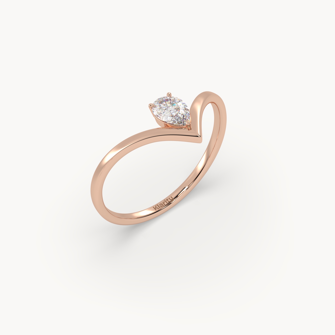 18k rose gold  v shaped pear diamond engagement solitaire ring