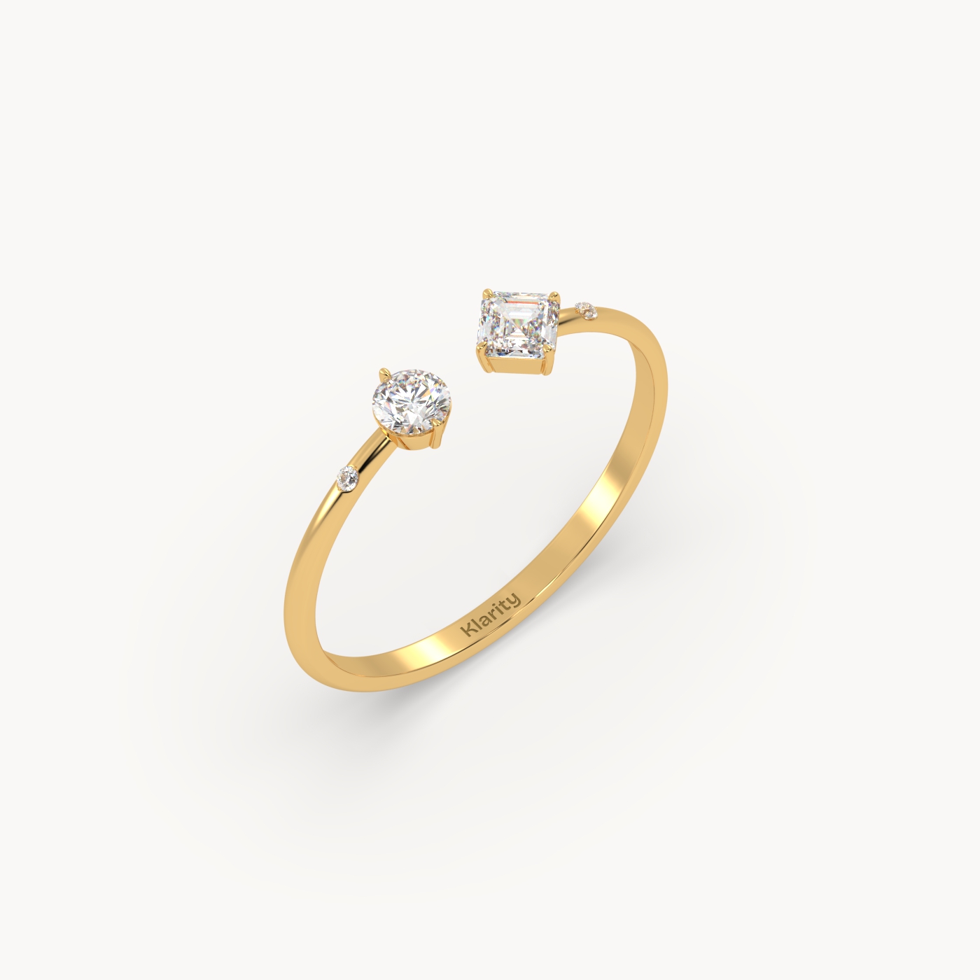 18k yellow gold two-stone open diamond ring with emerald-cut & round diamond