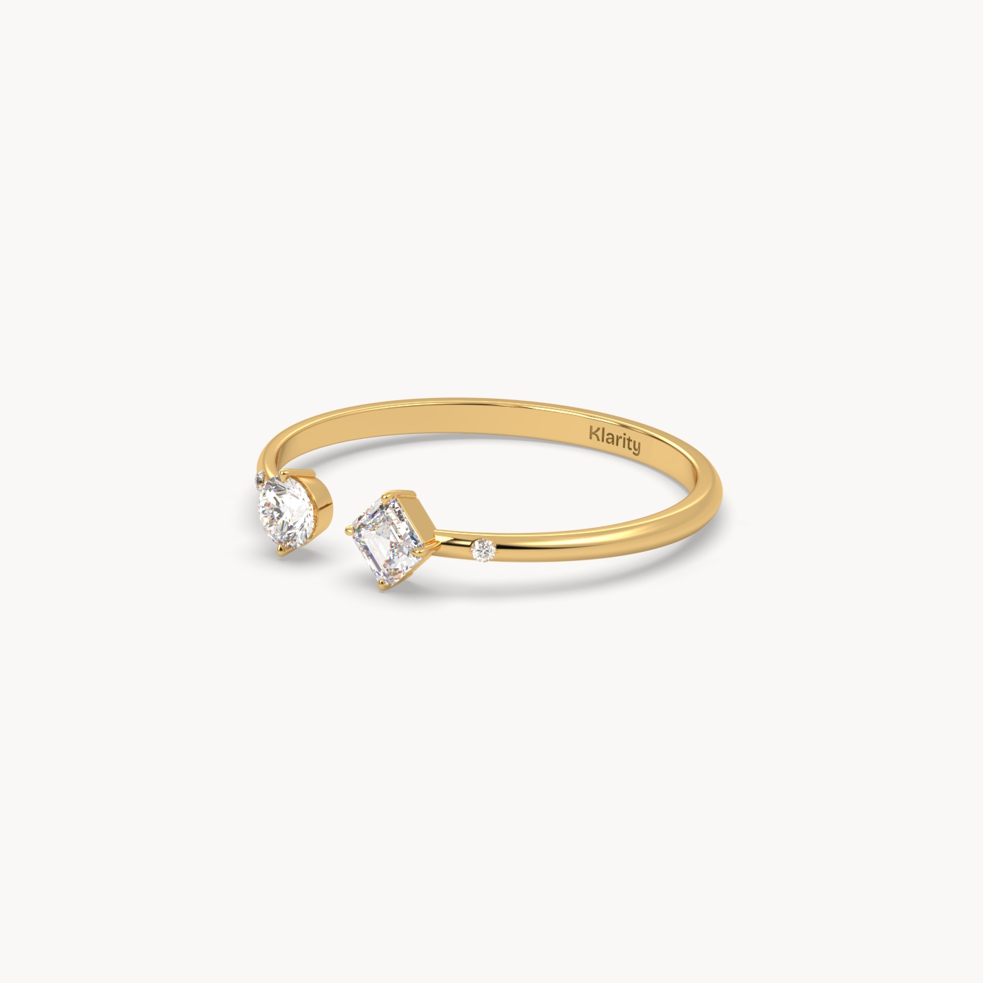 18k yellow gold two-stone open diamond ring with emerald-cut & round diamond