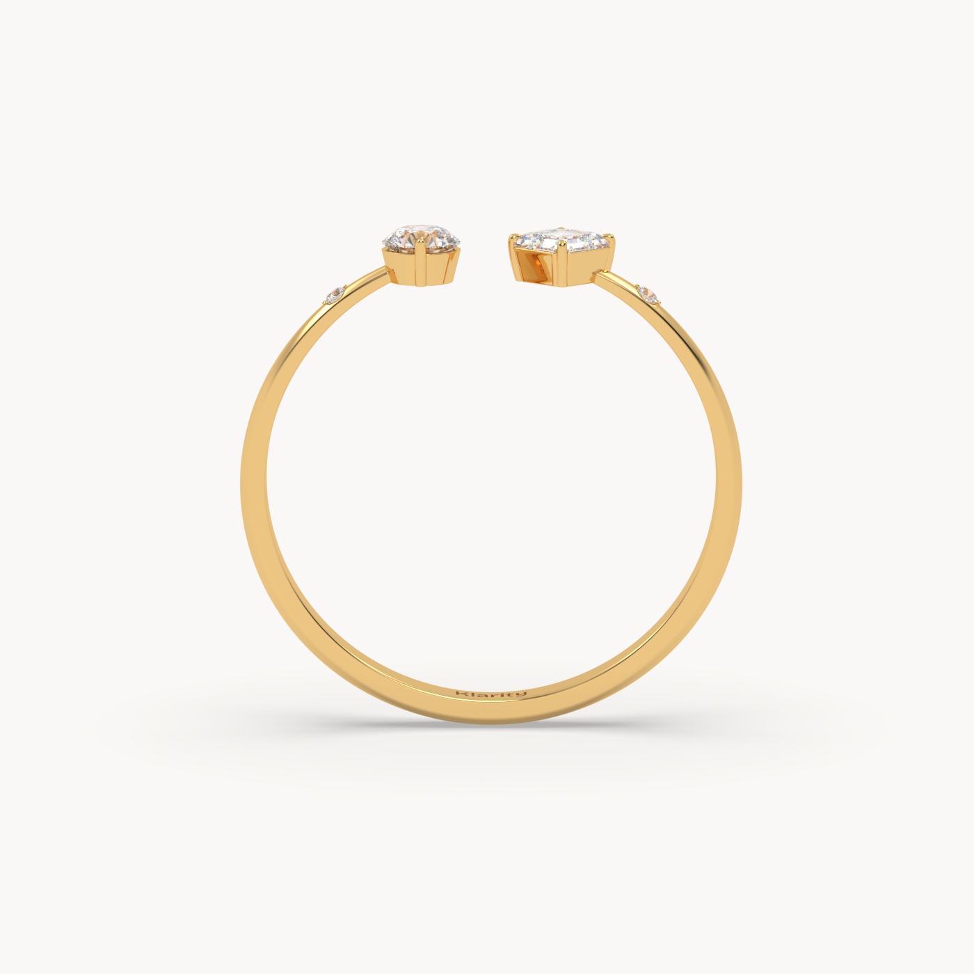 18k yellow gold two-stone open diamond ring with emerald-cut & round diamond