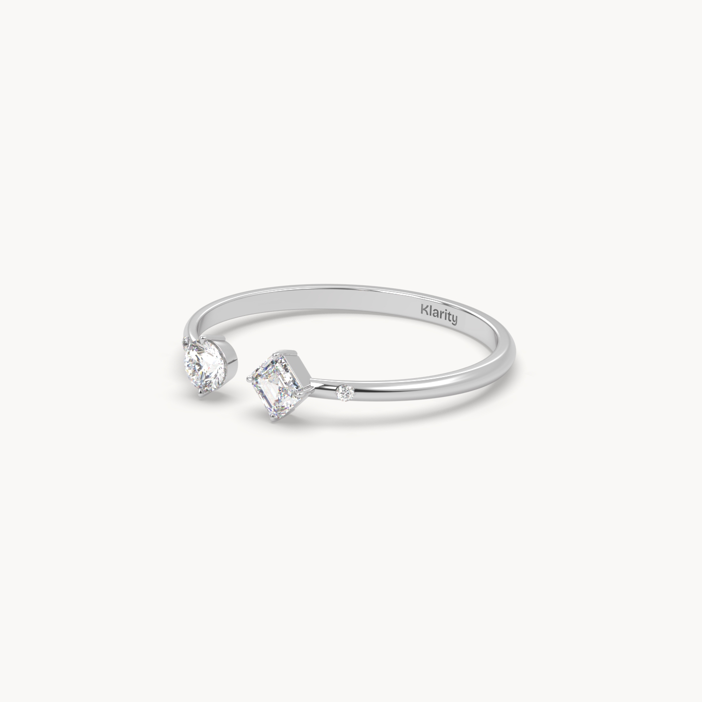 pt platinum two-stone open diamond ring with emerald-cut & round diamond